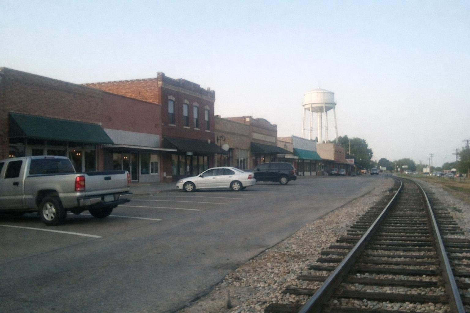 Older brick buildings on a small downtown square