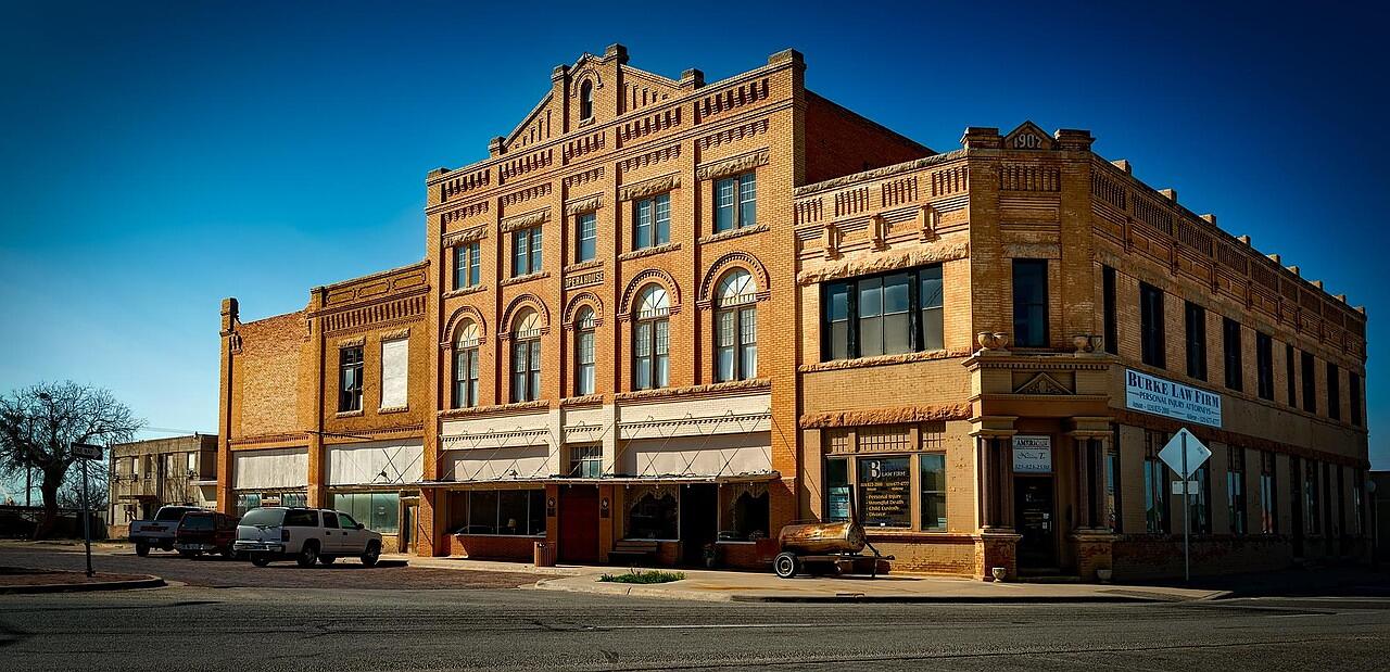 Brick storefronts on a historic Texas courthouse square